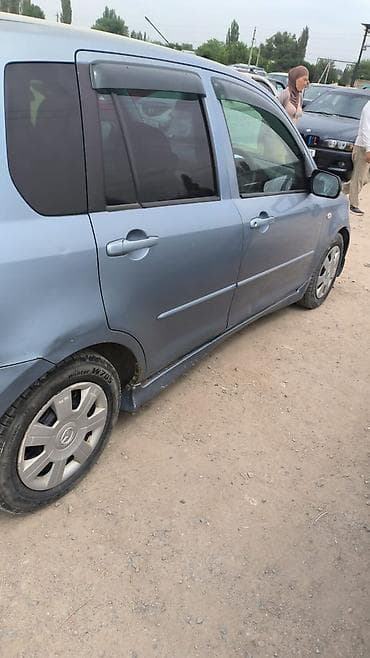 Mazda Demio: 2004 г., 1.5 л, Автомат, Бензин, Хэтчбэк — 6
