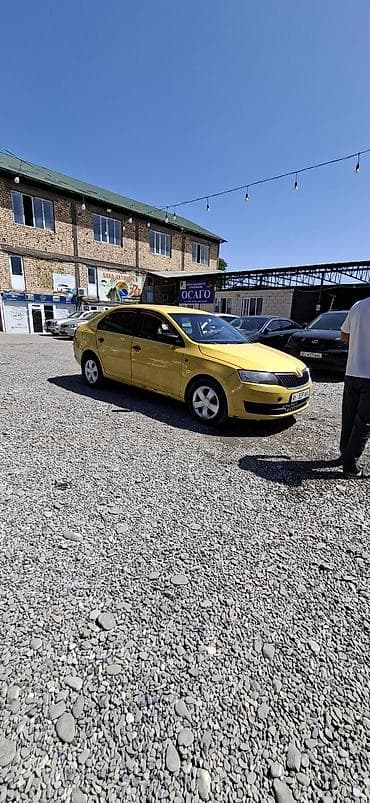 авто стенд: Skoda Rapid: 2015 г., 0.6 л, Механика, Бензин, Седан — 5