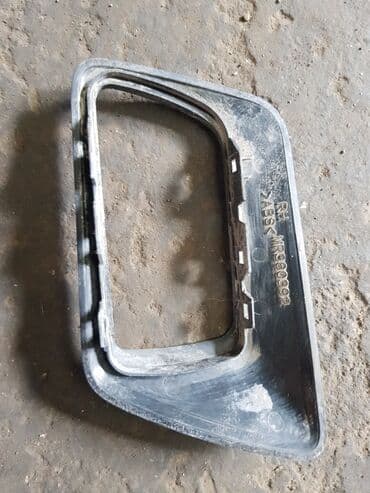 дом на кольосах: Mitsubishi Pajero IO кожух внутренней ручки, Митсубиси Паджеро Ио — 2