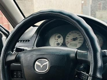 mc 2000: Mazda Familia: 2003 г., 1.6 л, Механика, Бензин, Хэтчбэк — 9
