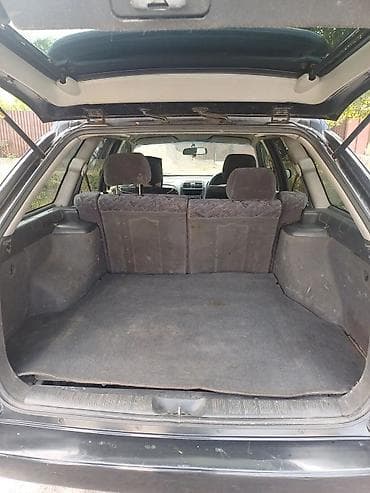 Транспорт: Mazda Capella: 1998 г., 2 л, Автомат, Универсал — 10