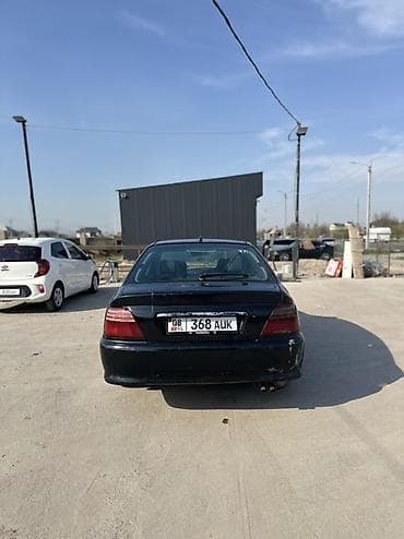 x5 2020: Черный седан среднего класса. Кузов 4-дверный, передний привод. Цвет — — 2