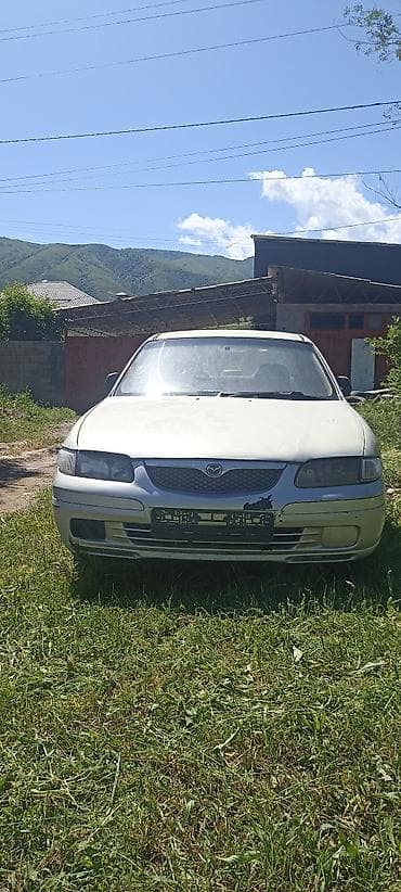 Mazda Capella: 1998 г., 1.8 л, Автомат, Бензин, Седан at lalafo.kg Mazda Capella: 1998 г., 1.8 л, Автомат, Бензин, Седан