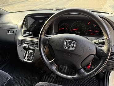 на вариант: Honda Odyssey: 2003 г., 2.3 л, Автомат, Газ, Минивэн — 4