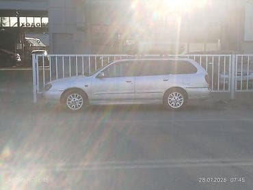 Nissan Primera: 2001 г., 2 л, Механика, Газ, Универсал — 4