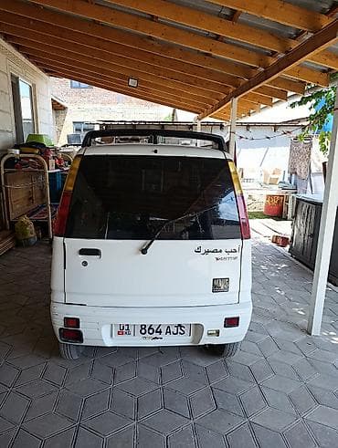 фара на ман: Daihatsu Move: 1998 г., Минивэн — 3
