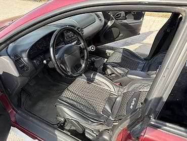 лизинк афто: Mazda Lantis: 1996 г., 1.5 л, Механика, Бензин, Седан — 6