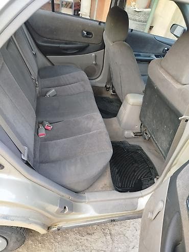 mazda мазда: Mazda 323: 2001 г., 1.6 л, Механика, Бензин, Седан — 2