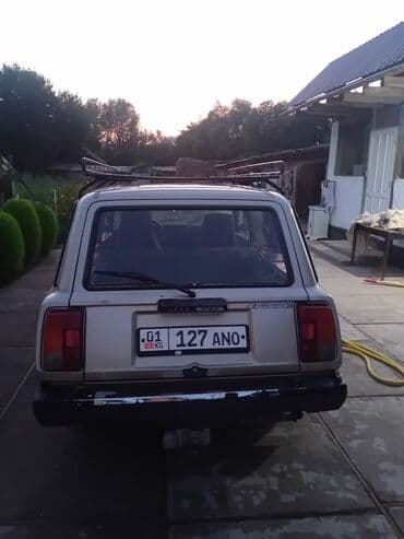 опель вектра а: Универсал Lada 2104 бежевого цвета, оснащенный багажником на крыше — 4