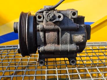 промышленные компрессор: Компрессор Mazda 1994 г., Б/у, Оригинал, Германия — 2