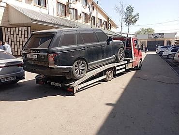 Услуги эвакуатора: С манипулятором, С лебедкой, С ломаной платформой — 1