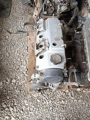 Двигатель Mitsubishi (рядный 4-цилиндровый, бензиновый). Атмосферный