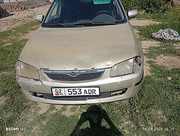 Mazda 323: 1999 г., 1.5 л, Механика, Бензин, Универсал
