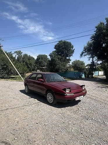 cdi 2 7: Mazda 323: 1994 г., 1.6 л, Механика, Бензин, Лифтбек — 2