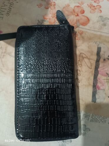 найден кошелек: Продается кошелек барсетка в отличном состоянии . по всем вопросам — 8