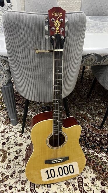 Акустические гитары — несколько моделей 1) Sevn (надпись на голове