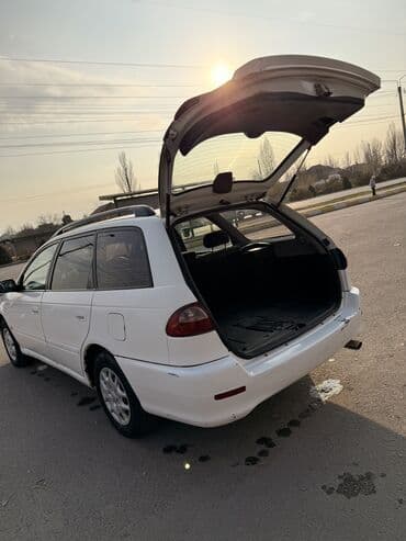 тонировка продаю: Toyota Caldina: 2001 г., 1.8 л, Автомат, Бензиновая, Универсал — 4