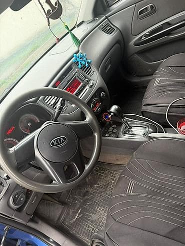 кызыл кия кыз: Kia Rio: 2011 г., 1.4 л, Автомат, Бензин, Седан — 3