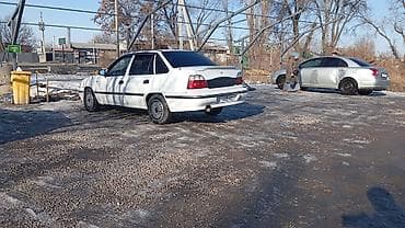 капот некси: Daewoo Nexia: 1995 г., Седан — 10