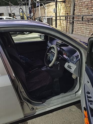 mini kooper: Mazda Demio: 2004 г., 1.3 л, Автомат, Бензин, Хэтчбэк — 6