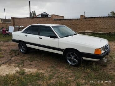 спойлер ауди а6: Белый седан Audi 100 с тонированными окнами. Автомобиль оснащен — 1