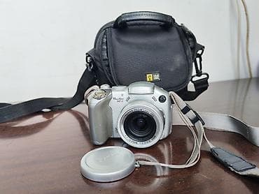 logic: Canon PowerShot S2 IS – компактная ультразум-камера с поворотным — 1