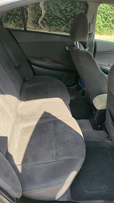 Nissan Primera: 2002 г., Седан — 6