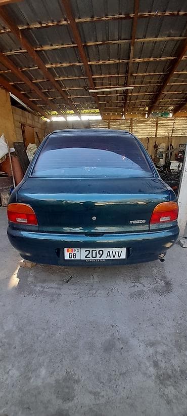 Mazda 323: 1995 г., Ручные, Седан