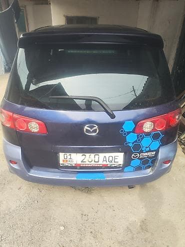 Mazda Demio: 2003 г., 1.3 л, Автомат, Бензин, Хетчбек — 4