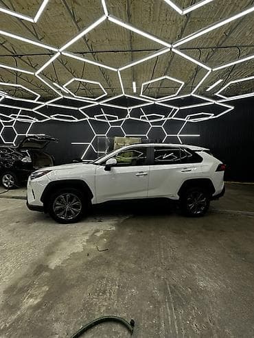 м рул: Toyota RAV4: 2022 г., 2.5 л, Автомат, Гибрид, Кроссовер — 8