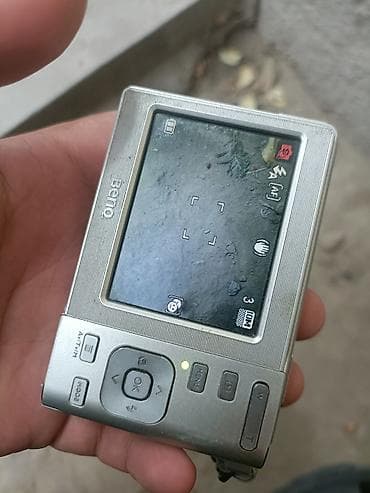 f2: Цифровой фотоаппарат BenQ компактного формата. - Матрица 10 Мп (CCD) — 2