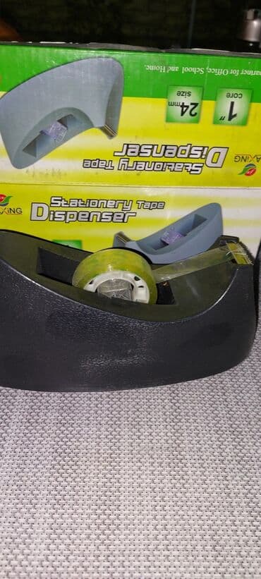 Удобный диспенсер для канцелярского скотча черного цвета at lalafo.kg Удобный диспенсер для канцелярского скотча черного цвета