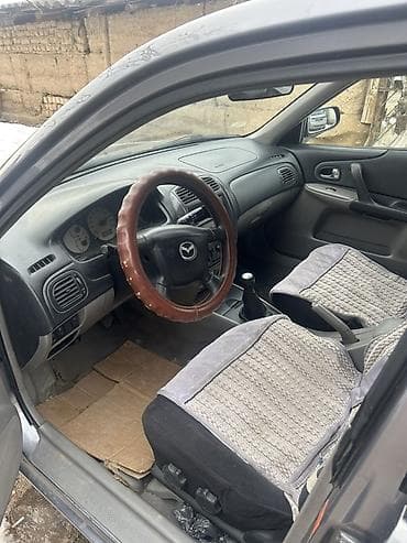 радар авто: Mazda Familia: 2003 г., Кол менен иштөөчү, Дизель, Хетчбек — 3