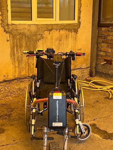 тефлоновый коврик: Электроприставка к инвалидной коляске + коляска - Передняя — 1