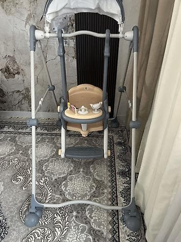 Детский мир: Детские напольные качели со стойкой и навесом. Особенности: - — 1