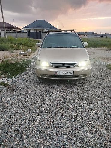одесей: Honda Odyssey: 1999 г., Газ — 1