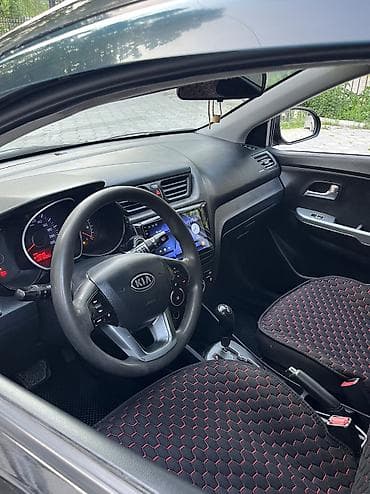 Транспорт: Kia Rio: 2012 г., 1.4 л, Автомат, Бензин, Хэтчбэк — 9