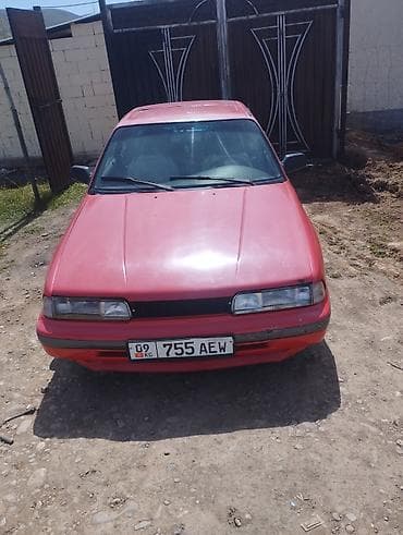 митсубиси спес стар: Mazda 626: 1990 г., Купе — 2