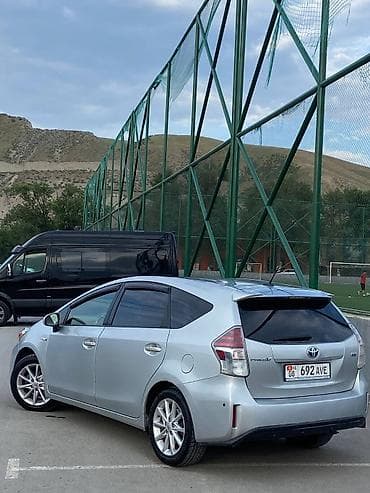 byd e7: Toyota Prius V: 2015 г., 1.8 л, Вариатор, Гибрид, Минивэн — 4