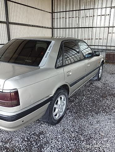 Мазда 626 об.2 90 г в хорошем состоянии кузов ровный без ржавчины дно