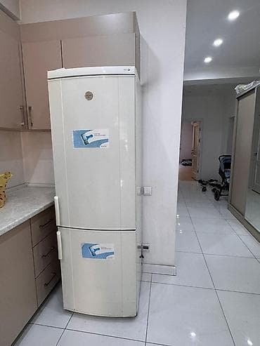 samsung galaxy a02: Двухкамерный холодильник с нижней морозильной камерой. Основные — 1