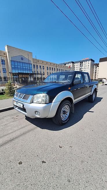 Nissan Navara: 2015 г., 2.4 л, Механика, Бензин, Пикап — 4