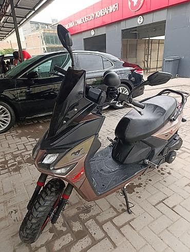 kia ev9: Скутер самурай (брендовые наклейки самурай на бортах) — 4