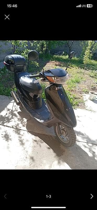 сукутер утка: Скутер Honda Dio (двухтактный) — черный - Компактный городской скутер — 4