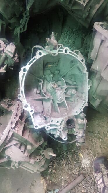 чехол на демио: Mazda323 2001 год коробка передач механика бензин — 1