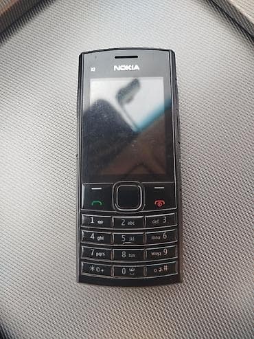 нокиа 1112: Кнопочный телефон Nokia X2-02, в отличном состоянии, но без батарии — 1