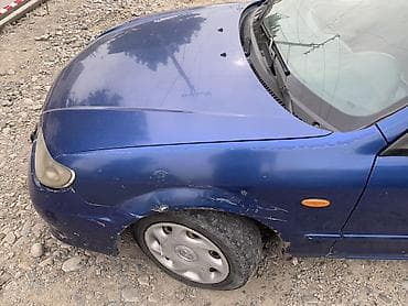 Продажа авто: Mazda Familia: 2001 г., 1.6 л, Механика, Бензин, Универсал — 2