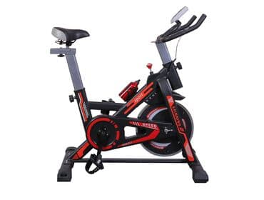 Велотренажер для спиннинга в черно-красной расцветке. Оснащен