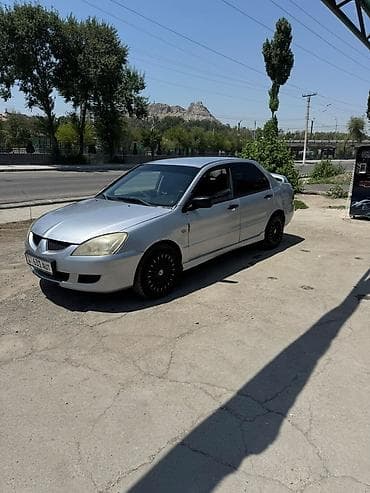 митсубиси оутлендер: Mitsubishi Lancer: 2003 г., 1.3 л, Механика, Бензин, Седан — 5