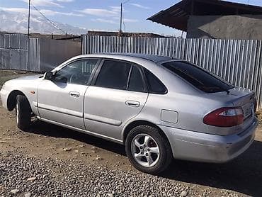 12 220: Mazda 626: 2000 г., 2 л, Механика, Бензин, Седан — 4